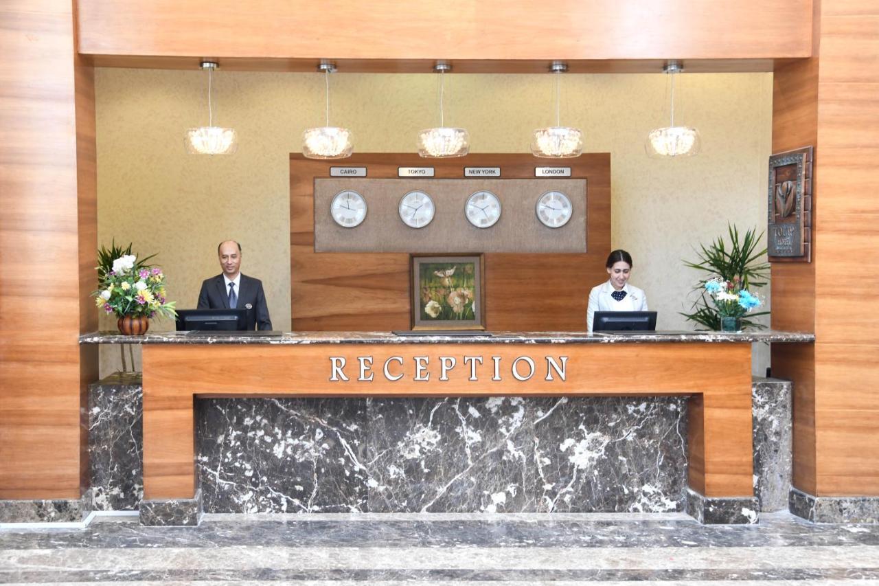 Tolip Family Park Hotel Каир Экстерьер фото Reception desk