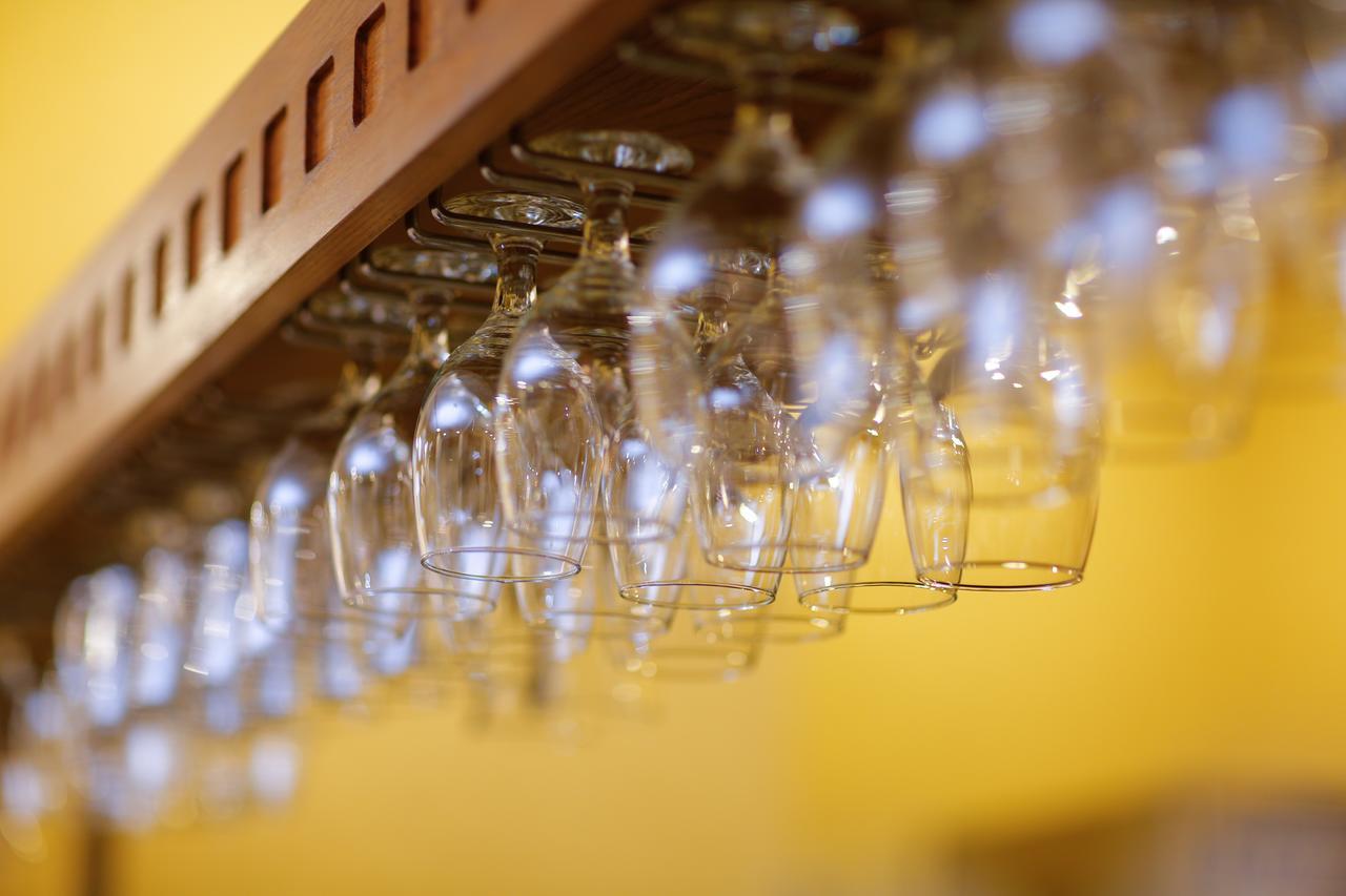 Tolip Family Park Hotel Каир Экстерьер фото Wine glasses hanging from a rack